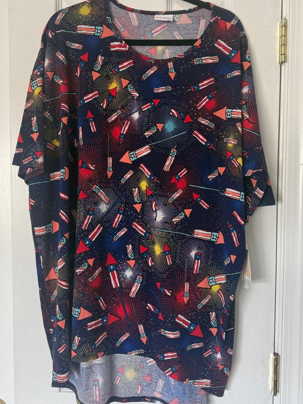 LuLaRoe Short Sleeve Tee in Navy with Red, White, Yellow & Teal Firework Print